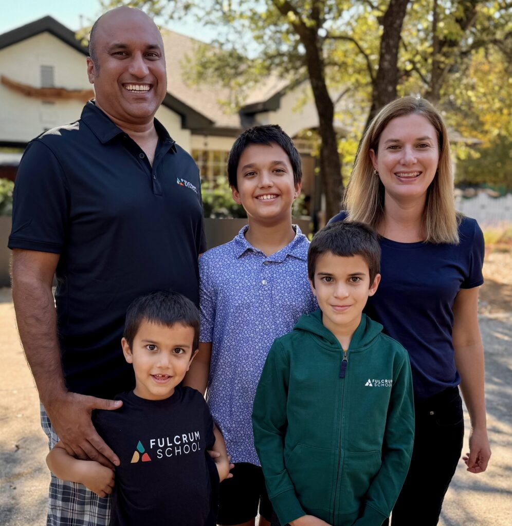 Family Photo In Front Of Fulcrum School 1